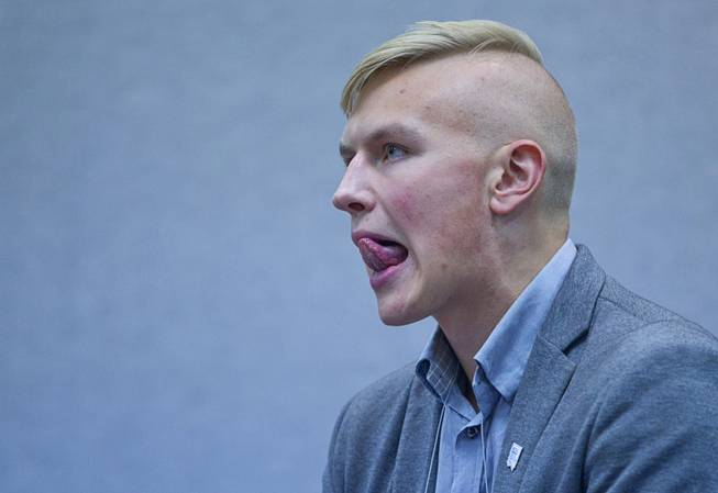 Tomasz Gawel of Cimerron-Memorial High School, reacts to a comment during a discussion of U.S. involvement in the Ukranian-Russia conflict at the 58th annual Las Vegas Sun Youth Forum in the Las Vegas Convention Center Thursday, Nov. 13, 2014.