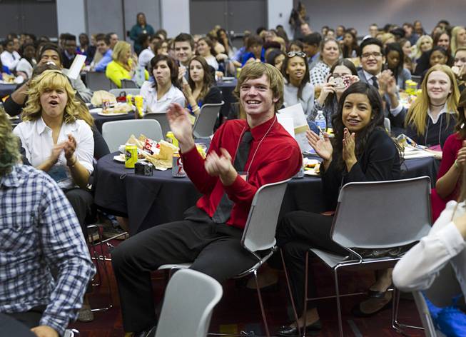 Students applaud lunch break entertainers during the 58th annual Las Vegas Sun Youth Forum at the Las Vegas Convention Center Thursday, Nov. 13, 2014.