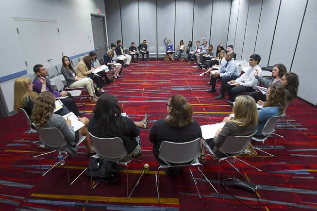 Students discuss crime issues in a forum moderated by Richard F. Boulware II, U.S. District Court judge for the District of Nevada, during the 58th annual Las Vegas Sun Youth Forum at the Las Vegas Convention Center Thursday, Nov. 13, 2014.