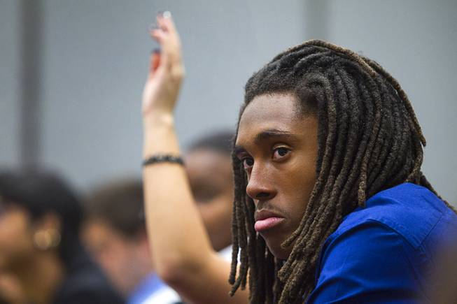 Davieon Carrington of Canyon Springs High School listens to a discussion during the 58th annual Las Vegas Sun Youth Forum at the Las Vegas Convention Center Thursday, Nov. 13, 2014.