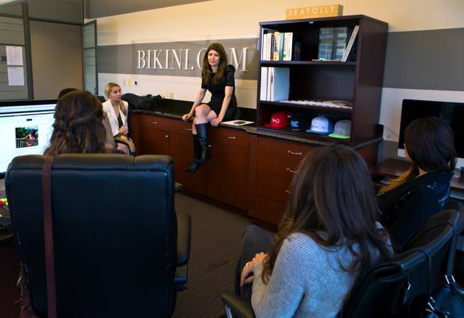Director Shannon Follansbee leads a staff meeting at Bikini.com which is an online retailer that has "pop up" shops at some of the most popular day clubs about the Strip on Friday, November 16, 2014.
