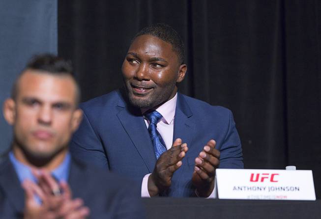 UFC fighter Anthony Johnson applauds during a UFC news conference at the Smith Center for the Performing Arts Monday, Nov. 17, 2014.