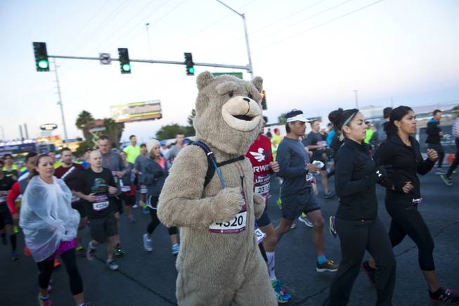 Runners take to the Las Vegas Strip during the 2014 Rock n Roll Marathon, Sunday Nov. 16, 2014.