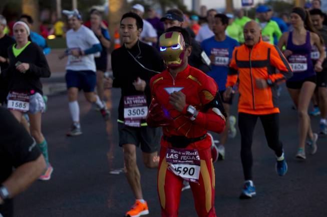 Runners take to the Las Vegas Strip during the 2014 Rock n Roll Marathon, Sunday Nov. 16, 2014.