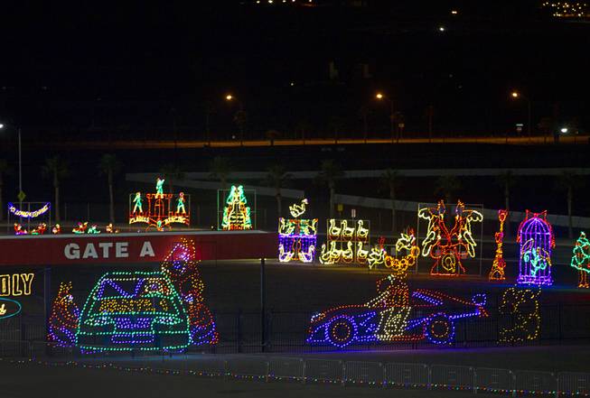 An automotive-themed display sponsored by Friendly Ford is shown during the Glittering Lights holiday extravaganza at Las Vegas Motor Speedway on Tuesday, Nov. 18, 2014. The 14th annual display features more than 1 million twinkling LED lights along a 2.5-mile course. A portion of the proceeds benefits Speedway Children's Charities. Glittering Lights is open through Jan. 4, 2015. Admission is $20 per vehicle.