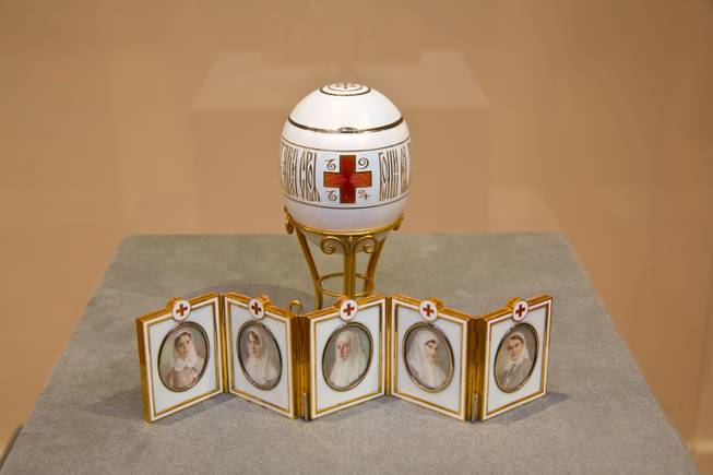 Imperial Red Cross Easter Egg with portraits (1915) on display in the exhibit “Faberge Revealed” at Bellagio Gallery of Fine Art.