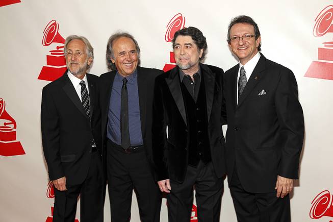 From (L-R): Neil Portnow, president of the National Academy of Recording Arts and Sciences (NARAS), honoree Joan Manuel Serrat, singer/songwriter Joaquin Sabina and Gabriel Abaroa, president/CEO of the Latin Academy of Recording Arts and Sciences, pose at the 2014 Latin Recording Academy Person of the Year Tribute to Joan Manuel Serrat at the Mandalay Bay Events Center Wednesday, Nov. 19, 2014.