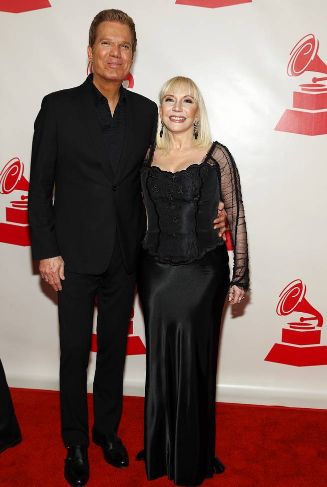 Willy Chirino (L) and Lissette arrive at the 2014 Latin Recording Academy Person of the Year Tribute to Joan Manuel Serrat at the Mandalay Bay Events Center Wednesday, Nov. 19, 2014.