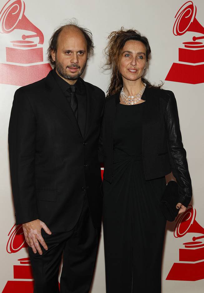 Musician Gustavo Casenave (L) and painter Vicky Barranguet arrive at the 2014 Latin Recording Academy Person of the Year Tribute to Joan Manuel Serrat at the Mandalay Bay Events Center Wednesday, Nov. 19, 2014.