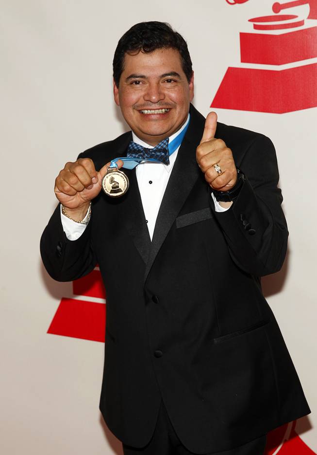 Musician Beto Jimenez arrives at the 2014 Latin Recording Academy Person of the Year Tribute to Joan Manuel Serrat at the Mandalay Bay Events Center Wednesday, Nov. 19, 2014.