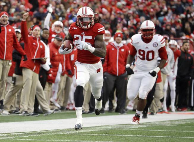 Wisconsin's Melvin Gordon during the first half of an NCAA college football game against Nebraska Saturday, Nov. 15, 2014, in Madison, Wis. (AP Photo/Morry Gash)