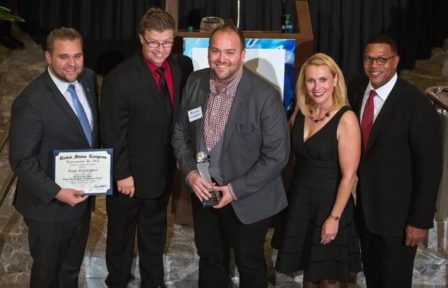 CEO Adam Cunningham with 87 AM wins the Private Business - Less Than 100 Employees Category during the Top Tech Exec awards at the Smith Center sponsored by Vegas Inc and Cox on Thursday, November 20, 2014.