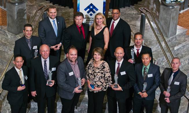 Winners gather with presenting staff at the Top Tech Exec awards at the Smith Center sponsored by Vegas Inc and Cox on Thursday, November 20, 2014.