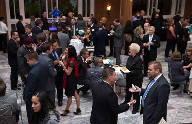 Attendees gather for the Top Tech Exec awards at the Smith Center sponsored by Vegas Inc and Cox on Thursday, November 20, 2014.