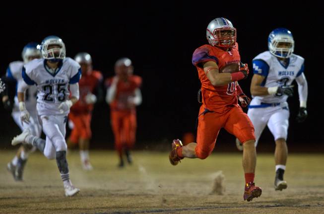 Liberty's Spencer Wilson #8 breaks free on a long touchdown run over Basic at the Sunrise Regional championship game on Friday, November 21, 2014.