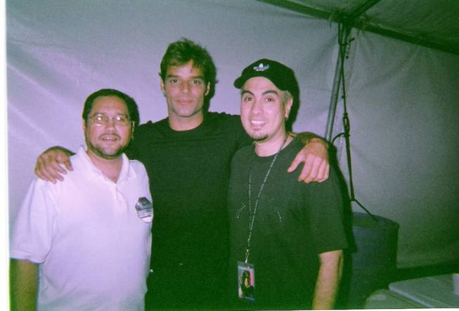 From left, Gilbert Lopez, Ricky Martin and Jerry Lopez are shown during the 1999-2000 "Livin' La Vida Loca" world tour.