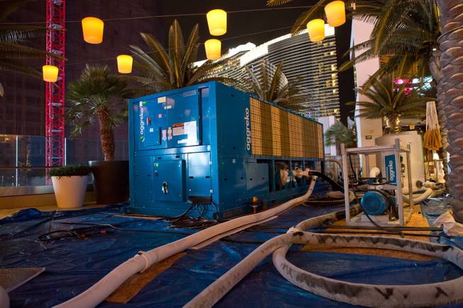 A large industrial-sized radiator is used to cool piping that will form the ice-skating rink at the Cosmopolitan on Thursday, Nov. 13, 2014, in Las Vegas.