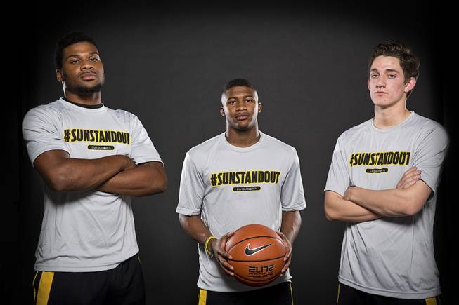 Clark High basketball players, from left, Ty'Rek Wells, Colby Jackson, Carter Olsen.