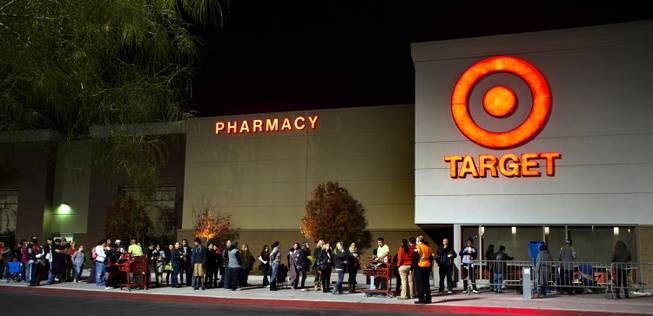 Target shoppers wait in line for the store to open for Black Thursday in Henderson