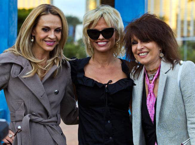 Vegas Magazine Editor Andrea Bennett, Pamela Anderson and Chrissie Hynde at the Welcome to Fabulous Las Vegas sign Thursday, Nov. 27, 2014. They were on hand as Dan Mathews of People for the Ethical Treatment of Animals married his longtime partner Jack Ryan there in a small wedding party.