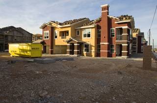 Construction continues on the Somerset Hills Apartments, 10695 S. Dean Martin Drive, Sunday, Dec. 7, 2014.