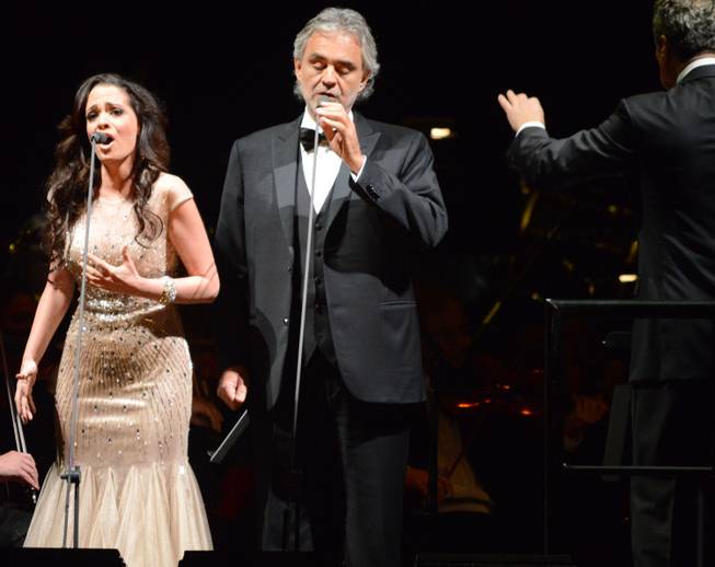 Andrea Bocelli is flanked by soprano Maria Aleida and music conductor Eugene Kohn at MGM Grand Garden Arena on Saturday, Dec. 6, 2014.