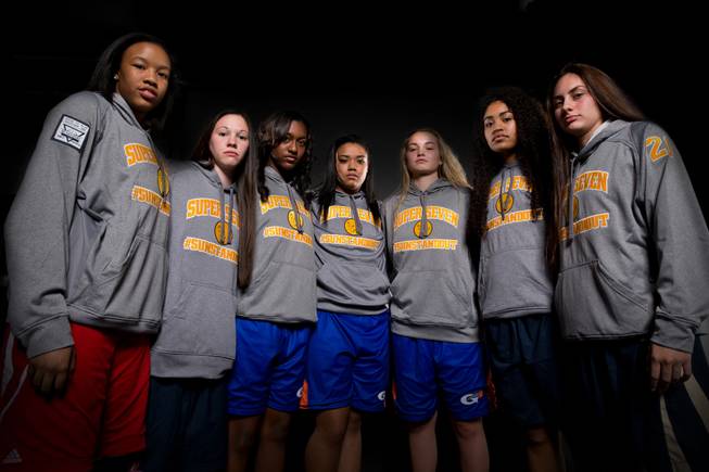 The 2014 Sun Super Seven girls high school basketball team poses for a photo. They are, from left, Ariona Gill, Kealy Brown, Madison Washington, Raychel Stanley, Megan Jacobs, Paris Strawther and Taylor Turney.