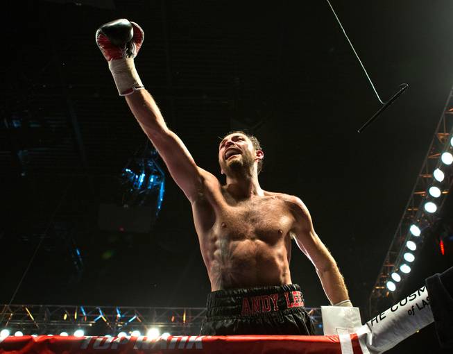 Andy Lee jumps up on the ropes to celebrate his win over Matt Korobov following their fight for the vacant WBO middleweight title at the Cosmopolitan on Saturday, December 13, 2014.