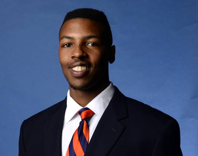 This undated portrait provided by Auburn University shows Auburn football player Jakell Lenard Mitchell. Mitchell was fatally shot early Sunday, Dec. 14, 2014, at an off-campus apartment complex where two former football players and another person were killed in a shooting in 2012, police and reports said. A 22-year-old man has been arrested on a felony warrant charging him with murder.