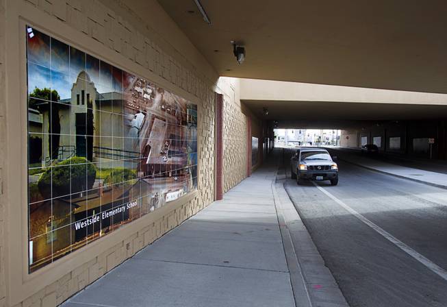 A driver slows to look at murals in the recently-opened F Street underpass at Interstate 15 Monday, Dec. 15, 2014. The underpass is decorated with 12 murals depicting scenes and people of significance to the West Las Vegas neighborhood and African-American history.