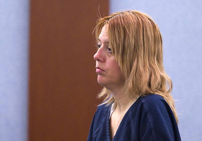 Terrie Sena, 43, appears in court at the Regional Justice Center in Las Vegas Tuesday, Dec. 16, 2014. Along with ex-husband Christopher Sena, 48, and his wife, Debra Sena, 50, Terrie Sena is accused of participating in sexual abuse that lasted 12 years and affected at least eight victims, some of whom are family members, according to Metro Police.