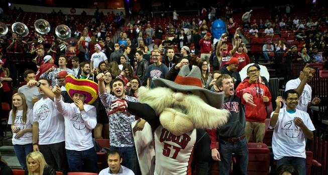 Hey Reb joins UNLV basketball team' fans in cheering for the players during their home game against visiting Portland at the Thomas & Mack Center on Wednesday, December 17, 2014.