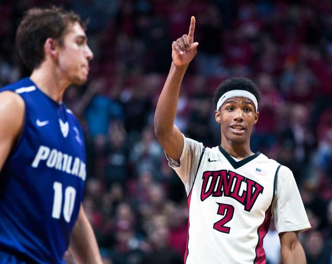 UNLV guard Patrick McCaw (2) calls a play during their game versus Portland at the Thomas & Mack Center on Wednesday, December 17, 2014.