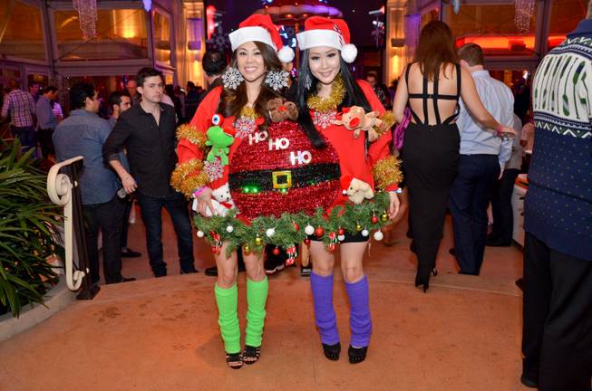 The 2014 Ugly Holiday Sweater Contest at Surrender on Wednesday, ...