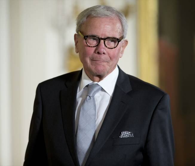 Journalist Tom Brokaw is introduced before being awarded the Presidential Medal of Freedom on Nov. 24, 2014, during a ceremony in the East Room of the White House in Washington. Brokaw announced Sunday, Dec. 21, 2014, that his cancer is in remission.