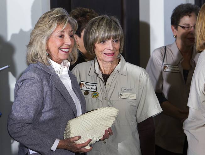 Congresswoman Dina Titus (D-NV), left, poses with Sandy Croteau, a Protector of Tule Springs volunteer, during a news conference marking the creation of the Tule Springs National Monument at the Las Vegas Paiute Resort northwest of Las Vegas, Monday, Dec. 22, 2014. The 22,650 acre site on the northern edge of the Las Vegas Valley features fossils from the Ice Age, including mammoths, bison, American Lions, camelops and sloths.
