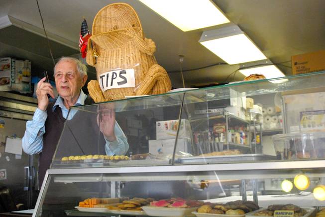 Ernie Feld, 89, owns a bakery in the town of Incline Village. He’s on the phone with a news reporter in mid-October asking him about a bear that attempted to enter his store by ripping off door and window frames in the middle of the night. Feld has had four bear incidents in six years at his bakery. 