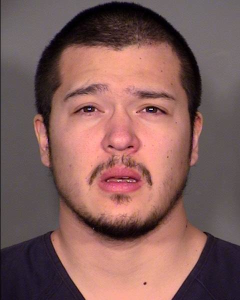 Metro Police said Jin Ackerman, 25, was arrested Friday, Dec. 26, 2014, in connection with a fatal shooting at a Walgreens story in northwest Las Vegas.