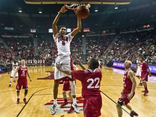 UNLV forward Christian Wood (5) dunk the ball over the Southern Utah defense during their game at the Thomas & Mack Center on Saturday, December 27, 2014.