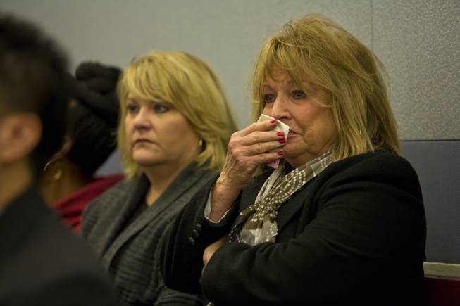 Family and friends of 63-year-old Michael Grubbs, who was killed on Nov 24 in a hit-and-run, tear up durring a preliminary hearing for the accused, 29-year-old Galina Stoyanova Kilova, Wed. Dec. 31, 2014.
