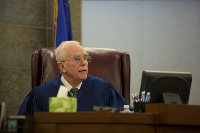 Justice of the Peace William Jansen listens to testimony during the preliminary hearing of Galina Stoyanova Kilova at the Regional Justice Center, Wed. Dec. 31, 2014. Kilova is accused in a hit-and-run on Nov. 24 that killed 63-year-old Michael Grubbs and injured his 18-month-old granddaughter.