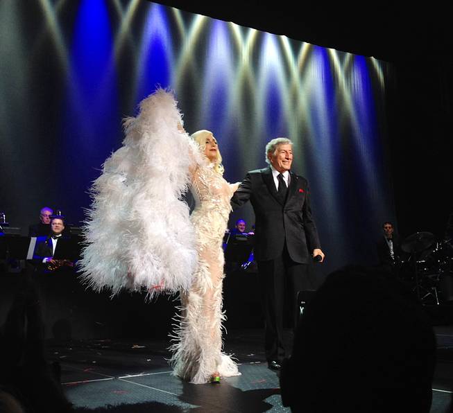 Lady Gaga and Tony Bennett wave to a standing-ovation audience at the Chelsea in the Cosmopolitan of Las Vegas on Tuesday, Dec. 30, 2014, at the end of their performance.