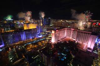 New Years fireworks explode over Las Vegas Strip casinos in this view from the High Roller observation wheel Thursday, Jan. 1, 2015. 