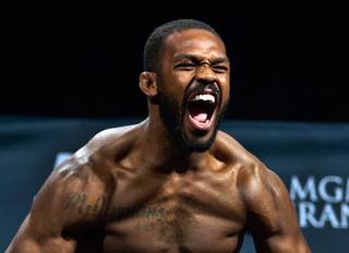 Light heavyweight title fighter Jon Jones screams for the fans during the UFC 182 weigh-ins at the MGM Grand on Friday, Jan. 2, 2014. 