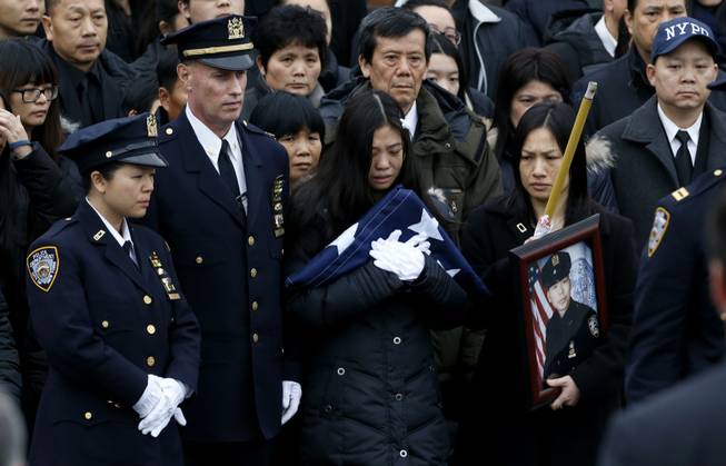 Wenjian Liu Widow at Funeral