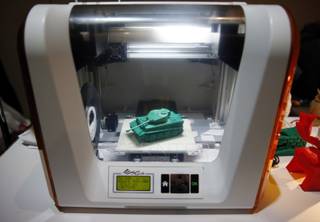The XYZprinting da Vinci Jr. 3-D printer is on display at CES Unveiled, a media preview event for CES International, Sunday, Jan. 4, 2015, in Las Vegas.