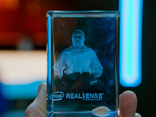 The Intel RealSense 3D Camera allows for the creation of 3D scanning which can be etched onto clear blocks and on display now at CES 2015 in the Las Vegas Convention Center on Tuesday, January 6, 2015.