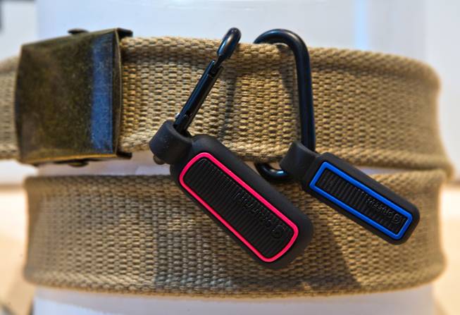 Griffon makes decorative Fitbit carries like theses for belts during CES 2015 at the Las Vegas Convention Center on Tuesday, January 6, 2015.