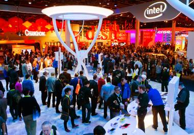 Participants wander about 2015 CES on Tuesday, Jan. 6, 2015, at the Las Vegas Convention Center.