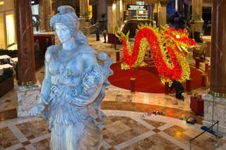 To celebrate Chinese New Year 2015 and welcome the Year of the Goat, The Forum Shops at Caesars with a team from  Artefact of Montreal, Canada, install a massive 950-lb. Chinese dragon display on Tuesday, January 6, 2015. .